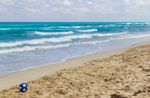 Ball on the beach Stock Photos