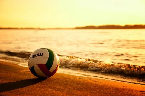 Ball on the beach sunset Foto stock