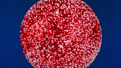 Ball on blue background. Silver New Year's toy rotates around its axis, macro ph Stock Footage 227717724