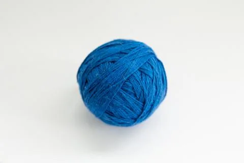 Ball of blue thread on a white background Stock-Fotos