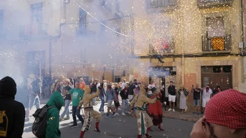 Ball de Diables Performing with Pyrotechnics at Santa Tecla 2025 Stock Footage 331111376