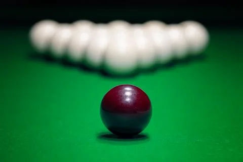 Ball is displayed on the pool table against the background of other balls Stock-Fotos