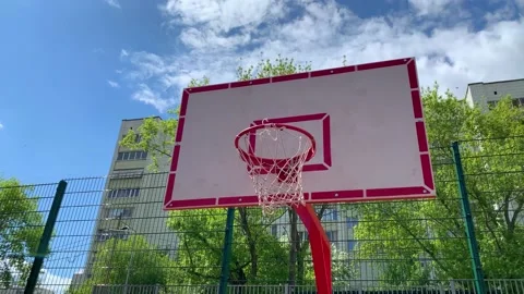 Ball falling into basket after third attempt, aim achievement Stock Footage 197312311