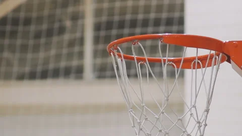 Ball falls into the ring. a successful throw brought the result Stock Footage 86048023