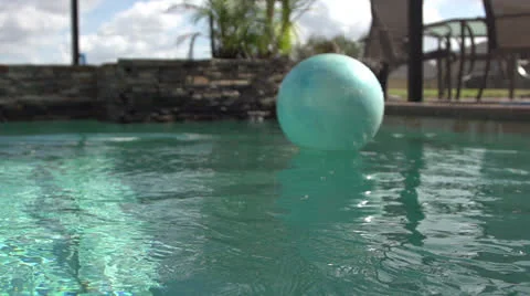 Ball Floating in Pool HD Video Stock Footage 24632859