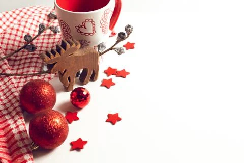 Ball gloss with coffee mug and reindeer wood toy and season greeting Stock Photos