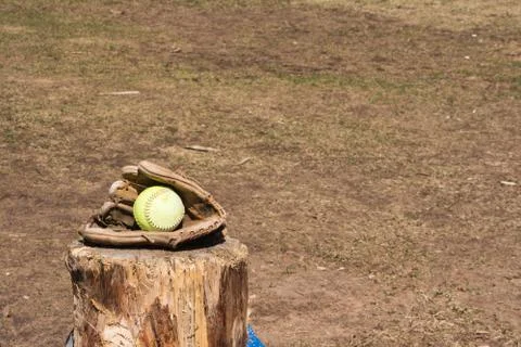 Ball in glove Stock Photos