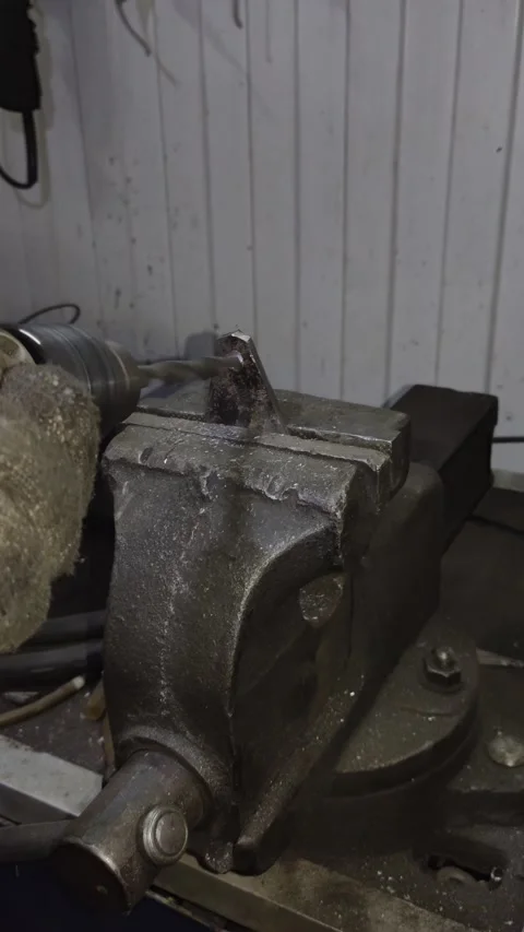 Ball Joint Drilling on Control Arm in Auto Workshop Setting Stock Footage 346171121