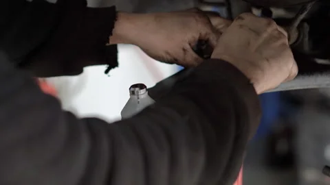 Ball joint replacement in a car Stock Footage 263908701