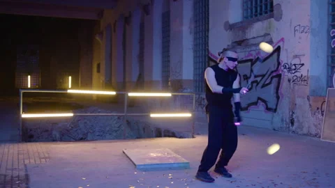 Ball Juggler - performs in an abandoned place at night 動画素材 281292146