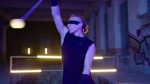 Ball Juggler - performs in an abandoned place at night 動画素材 281292450