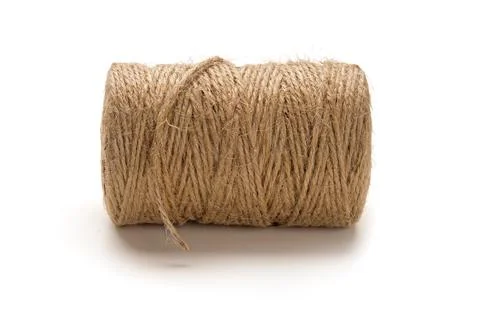 Ball of Jute string, often used for gardening isolated on white background Foto stock