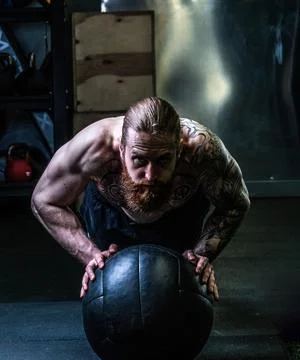Ball - man ups beard push athletic medicine push caucasian fitness, concept Stock Photos