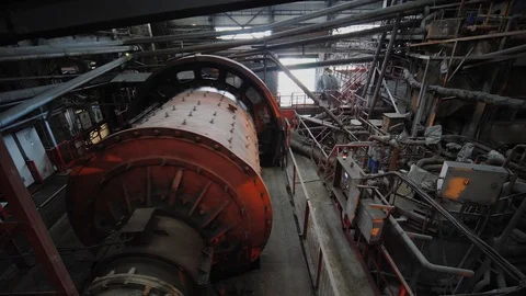 Ball mill grinds ore on the ore-dressing factory. Copper processing industry Video stock 121756430
