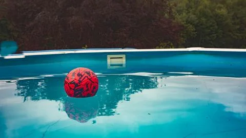 Ball in the pool Stock Photos