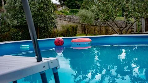 Ball in the pool Stock Photos