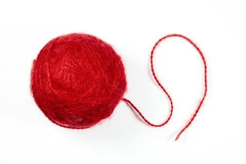 A ball of red woolen threads on a white background Stock Photos