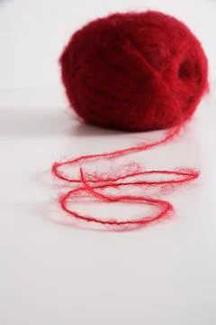 Ball of red yarn Stock Photos