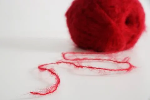 Ball of red yarn Stock Photos