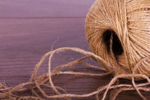 Ball of string on a wooden background Stock Photos