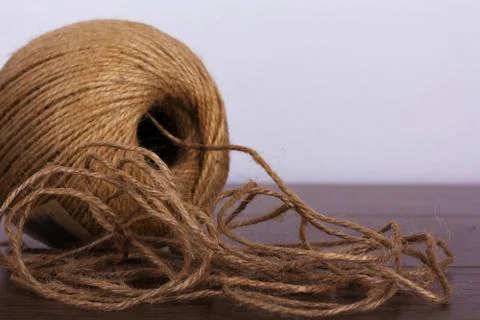 Ball of string on a wooden background Stock Photos