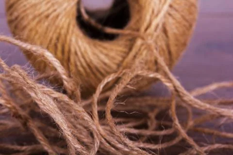 Ball of string on a wooden background Stock Photos