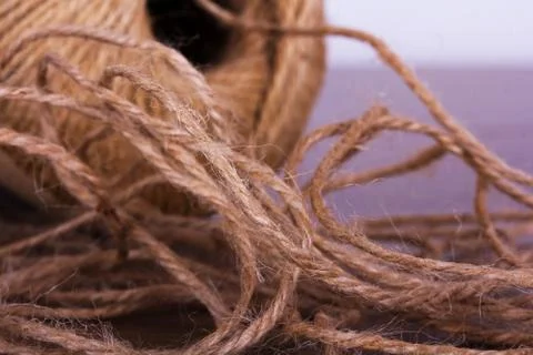 Ball of string on a wooden background Stock Photos