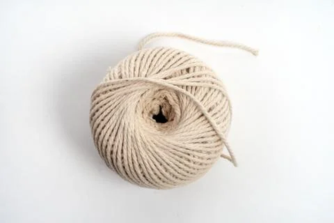 Ball of string,wound, coiled isolated on white. Stock Photos