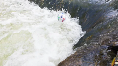 Ball stuck in a stream Stock-Footage 320558355
