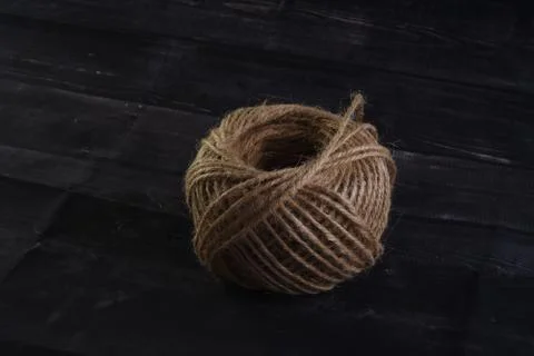 Ball of thread on a dark background Stock Photos