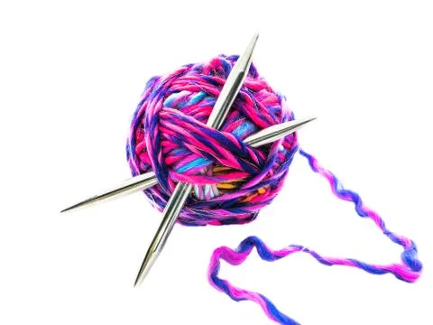 Ball of thread with knitting needles isolated on a white background. Stock Photos