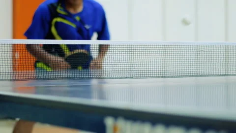 The ball through the table tennis net Stock Footage 232123257