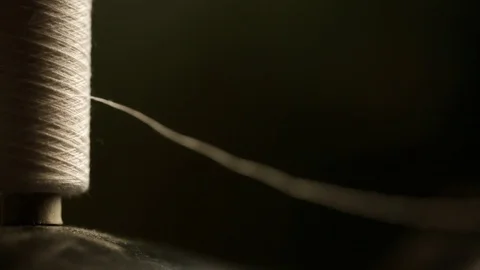 A ball of white thread on an old sewing machine at work Stock Footage 128597974