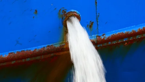 Ballast water flow through ship hole 4k intro outro for business  Stock Footage 94939116