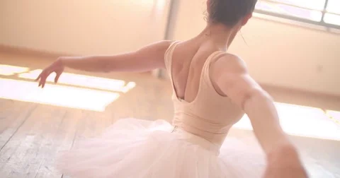 Ballerina dancer on the floor with her hands in position Stock Footage 80275370