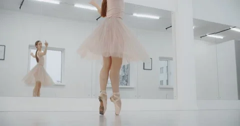 Ballerina dances on the ends of her pointe shoes, woman dance on her toes Stock Footage 148085069