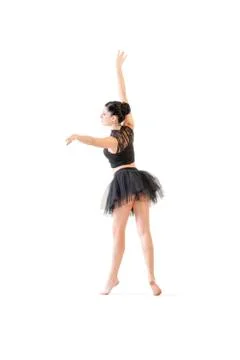 Ballerina dancing and posing in studio for a performance wearing black Stock Photos