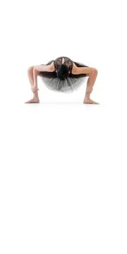 Ballerina dancing and posing in studio for a performance wearing black Stock Photos