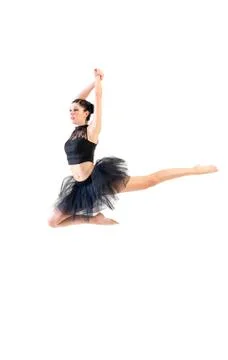 Ballerina dancing and posing in studio for a performance wearing black Stock Photos