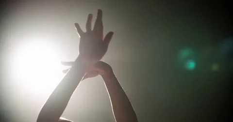 Ballerina dancing on stage, close-up of only hands with magic light  Vídeos de archivo 73424508