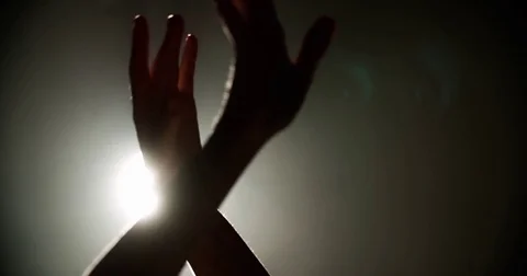 Ballerina dancing on stage, close-up of only hands with magic light on Stock-Footage 73424559