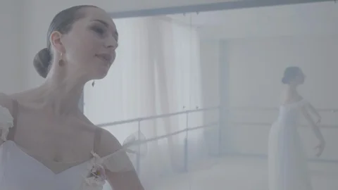 Ballerina dancing in studio Stock Footage 92977903