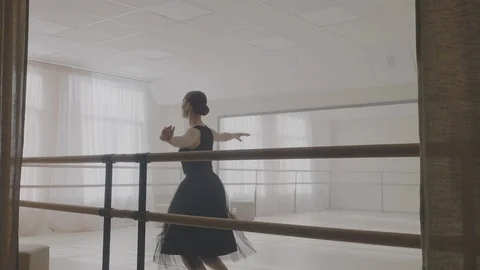 Ballerina dancing in studio Stock Footage 92986344
