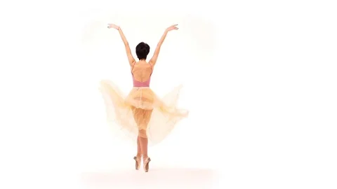 Ballerina is dancing in the studio on a white background - slow motion Stock Footage 83443803