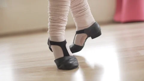 Ballerina doing practice and stretching movements in studio Stock Footage 104659987