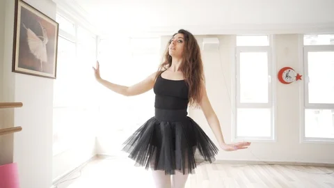 Ballerina doing practice and stretching movements in studio Stock Footage 104661204