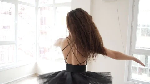 Ballerina doing practice and stretching movements in studio Stock Footage 104678296