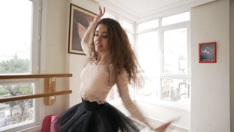 Ballerina doing practice and stretching movements in studio Stock Footage 104682748