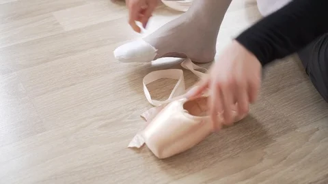 Ballerina doing practice and stretching movements in studio Stock Footage 104689867