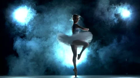 Ballerina doing a workout  on blue Stock Footage 51773384
